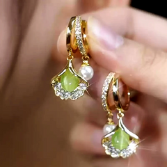Close-up detail of the sparkling zircons and plating on the Crystal Ginkgo Earrings