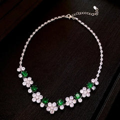 Detailed view of the 14K Gold-Plated Green Diamond Zircon Flower Necklace And Earring Set chain and pendant