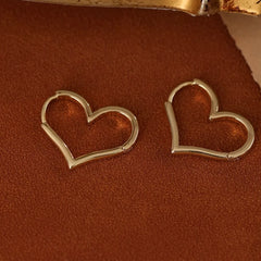Angled view of the 14K Gold-Plated Heart-Design Earrings