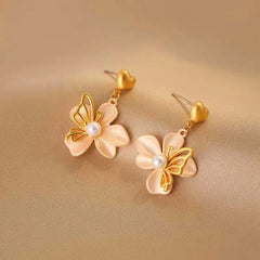 Close-up detail of the sparkling zircons and plating on the Heart Flower Earrings