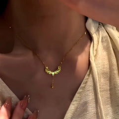 Detailed view of the 14K Gold-Plated Heart Angel Wing Necklace chain and pendant