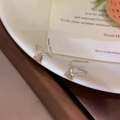 Angled view of the 14K Gold-Plated Heart Threader Earrings