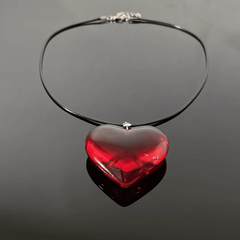 Close-up of the pendant and clasp on the Red Heart Necklace