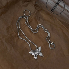 Detailed view of the 14K Gold-Plated Hollow Butterfly Necklaces chain and pendant