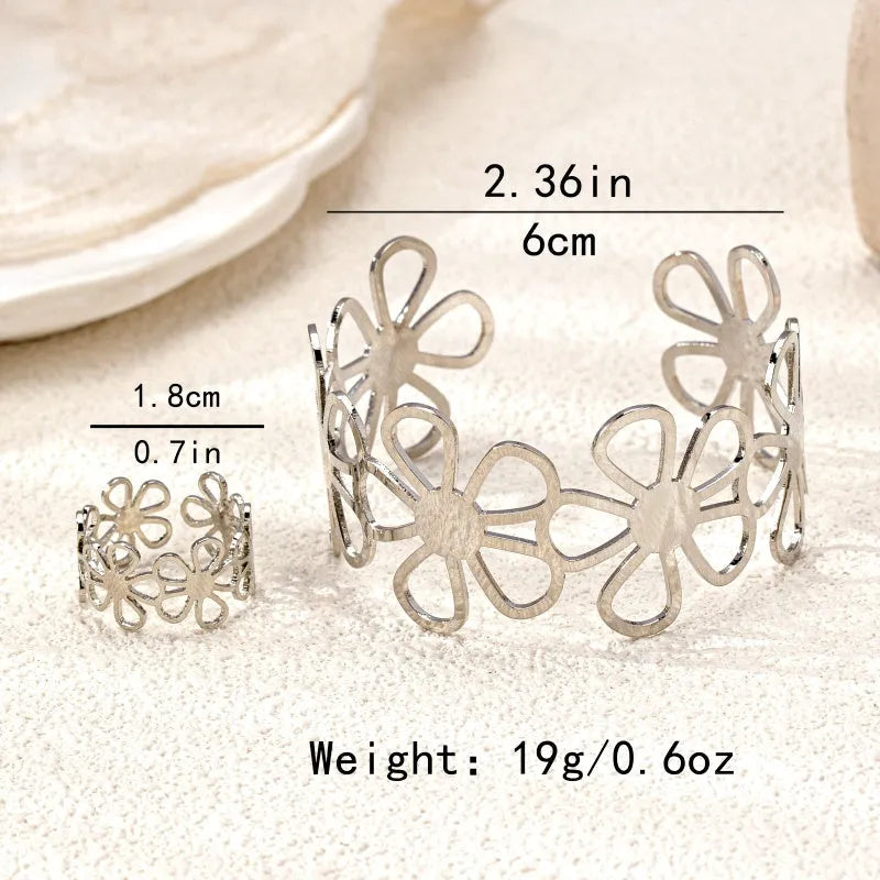 Full view of the elegant 14K Gold-Plated Hollow Flower Bracelet And Rings