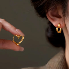 Close-up detail of the sparkling zircons and plating on the Hollow Heart Earrings