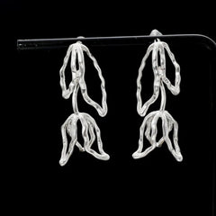 Angled view of the 14K Gold-Plated Hollow Tulip Earrings