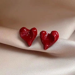 Angled view of the 14K Gold-Plated Irregular Heart Stud Earrings