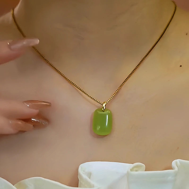 Close-up of the pendant and clasp on the Jade Square Pendant