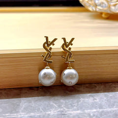 Angled view of the 14K Gold-Plated Letter Diamond Pearl Earrings