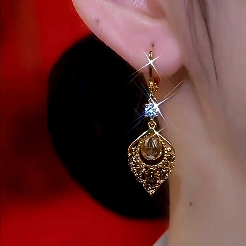 Close-up detail of the sparkling zircons and plating on the Diamond Knot Earrings