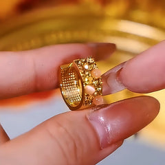 Close-up detail of the sparkling zircons and plating on the Cat's Eye Hoops