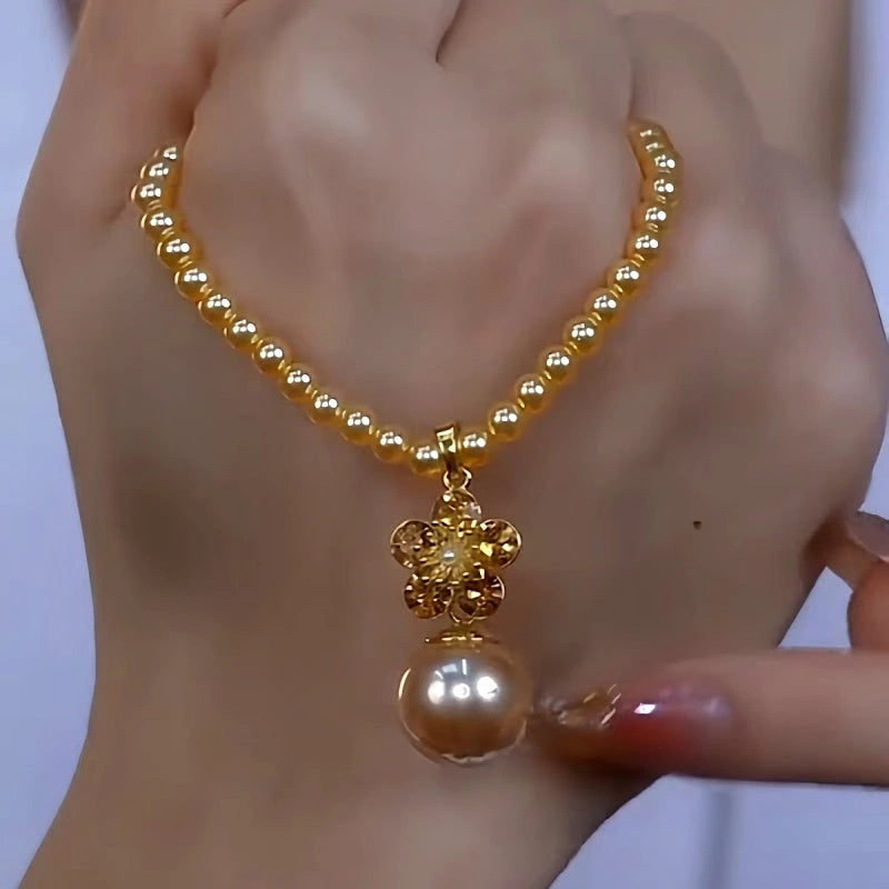 Detailed view of the 14K Gold-Plated Luxury Brown Zircon Pearl Necklace chain and pendant