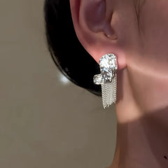 Angled view of the 14K Gold-Plated Luxury Butterfly Tassel Earrings