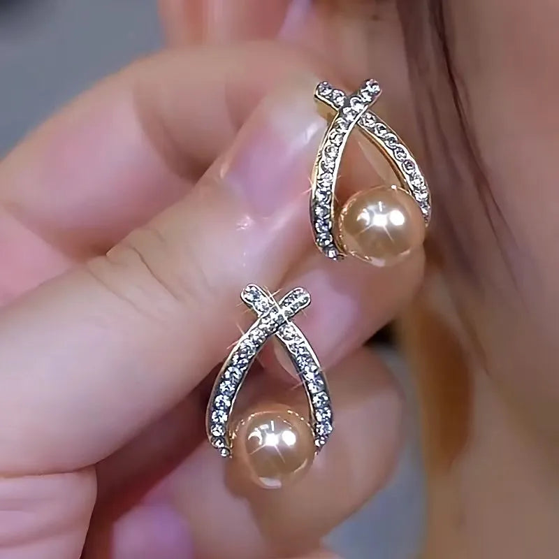 Angled view of the 14K Gold-Plated Luxury Daimond Pearl Earrings