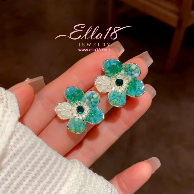 Close-up detail of the sparkling zircons and plating on the Petal Flower Earrings