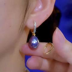 Close-up detail of the sparkling zircons and plating on the Purple Pearl Earrings