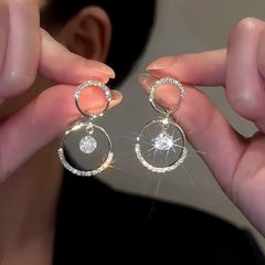 Close-up detail of the sparkling zircons and plating on the Wide Diamond Hoops