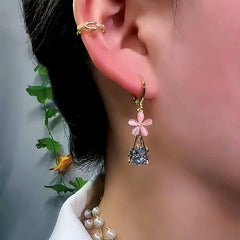 Close-up detail of the sparkling zircons and plating on the Pink Flower Earrings