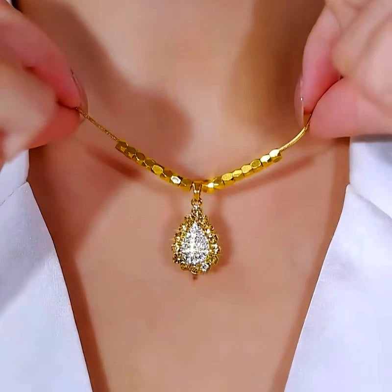 Close-up of the pendant and clasp on the Water Drop Necklace