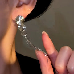 Close-up detail of the sparkling zircons and plating on the Fan Tassel Earrings