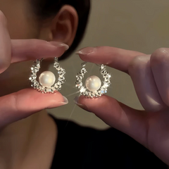 Angled view of the 14K Gold-Plated Luxury Pearl Hoop Earrings