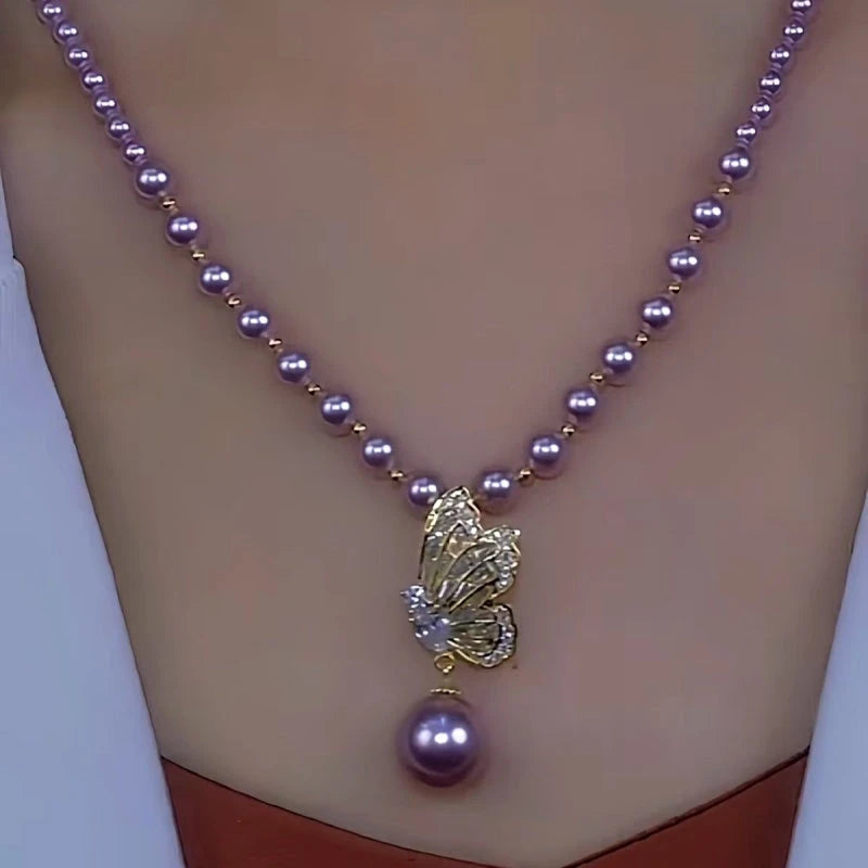 Close-up of the pendant and clasp on the Butterfly Necklace