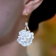 Close-up detail of the sparkling zircons and plating on the Super Fairy Earrings