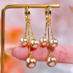 Close-up detail of the sparkling zircons and plating on the Pearl Tassel Earrings