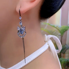 Close-up detail of the sparkling zircons and plating on the Diamond Bow Ear Hooks