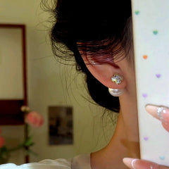 Close-up detail of the sparkling zircons and plating on the Flower Jacket Earrings