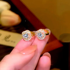 Model showcasing the dangle and style of the 14K Gold-Plated Luxury Zircon Diamond Little Hoop Earrings