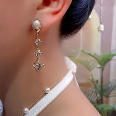 Close-up detail of the sparkling zircons and plating on the Zircon Pearl Tassel