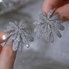 Angled view of the 14K Gold-Plated Luxury Zircon Firework Earrings
