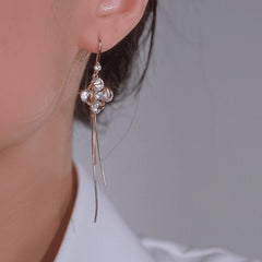 Close-up detail of the sparkling zircons and plating on the Flower Ear Hooks