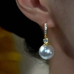 Close-up detail of the sparkling zircons and plating on the Zircon Pearl Earrings