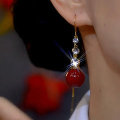 Close-up detail of the sparkling zircons and plating on the Red Pearl Threaders