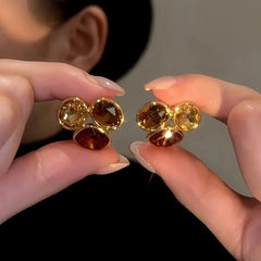 Close-up detail of the sparkling zircons and plating on the Zircon Stud Earrings