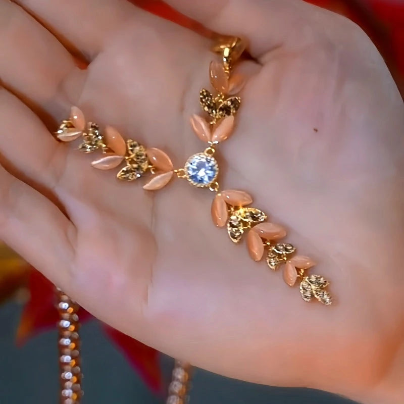 Close-up of the pendant and clasp on the Wheat Tassel Necklace