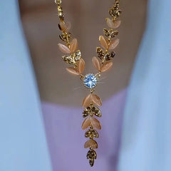 14K Gold-Plated Luxury Zircon Wheat Tassel Necklace worn to showcase its length and pendant detail