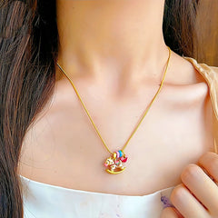 14K Gold-Plated Macaron-Colored Rocking Horse Necklaces worn to showcase its length and pendant detail