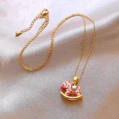 Detailed view of the 14K Gold-Plated Macaron-Colored Rocking Horse Necklaces chain and pendant