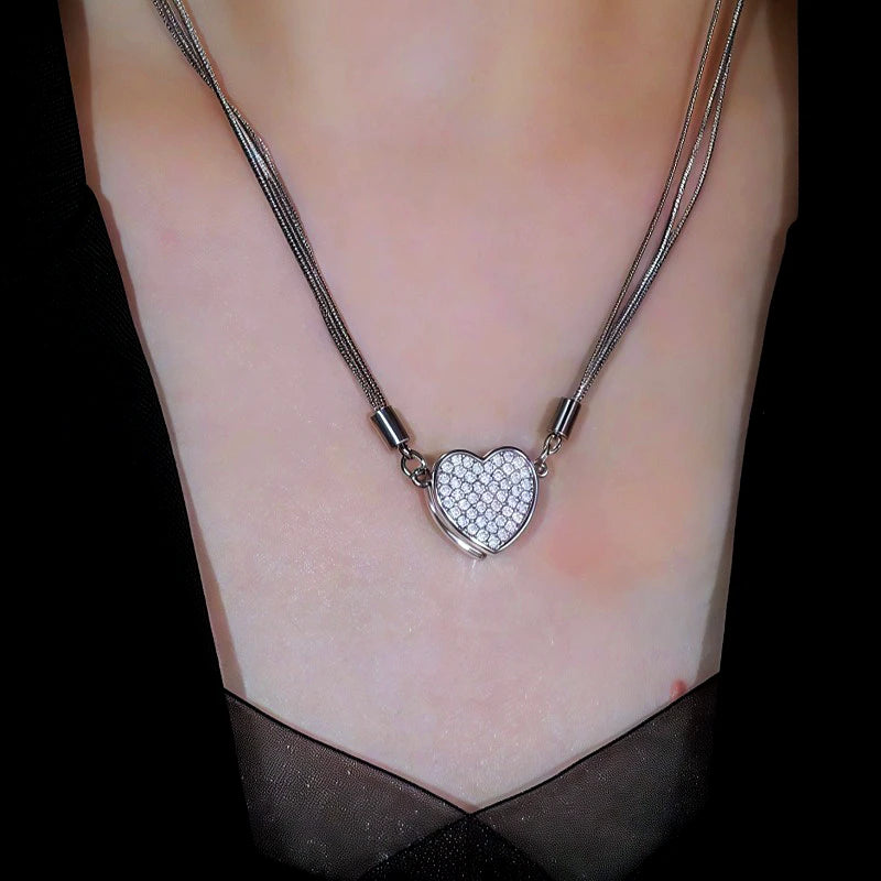 Close-up of the pendant and clasp on the Magnetic Heart Necklaces