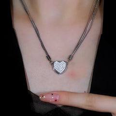 Detailed view of the 14K Gold-Plated Magnetic Bling Heart Necklaces chain and pendant