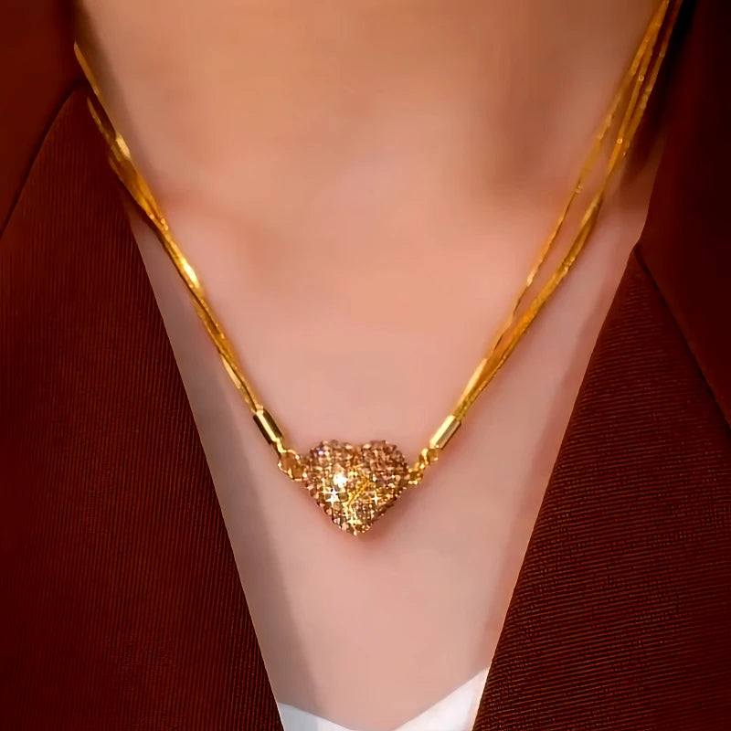 Close-up of the pendant and clasp on the Magnetic Heart Necklace
