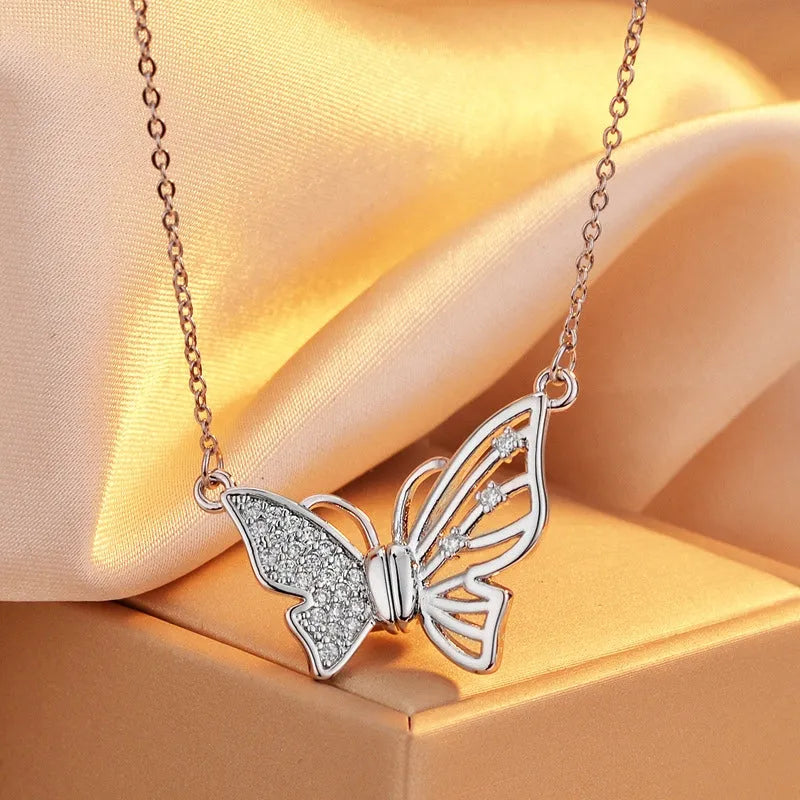 Detailed view of the 14K Gold-Plated Magnetic Zircon Butterfly Necklace chain and pendant