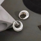 Matte Brushed Silver Chunky Thick Hoop Earrings Product Flat Lay