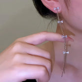 Long Silver Crystal Bow Tassel Drop Earrings for Women, Worn on Ear
