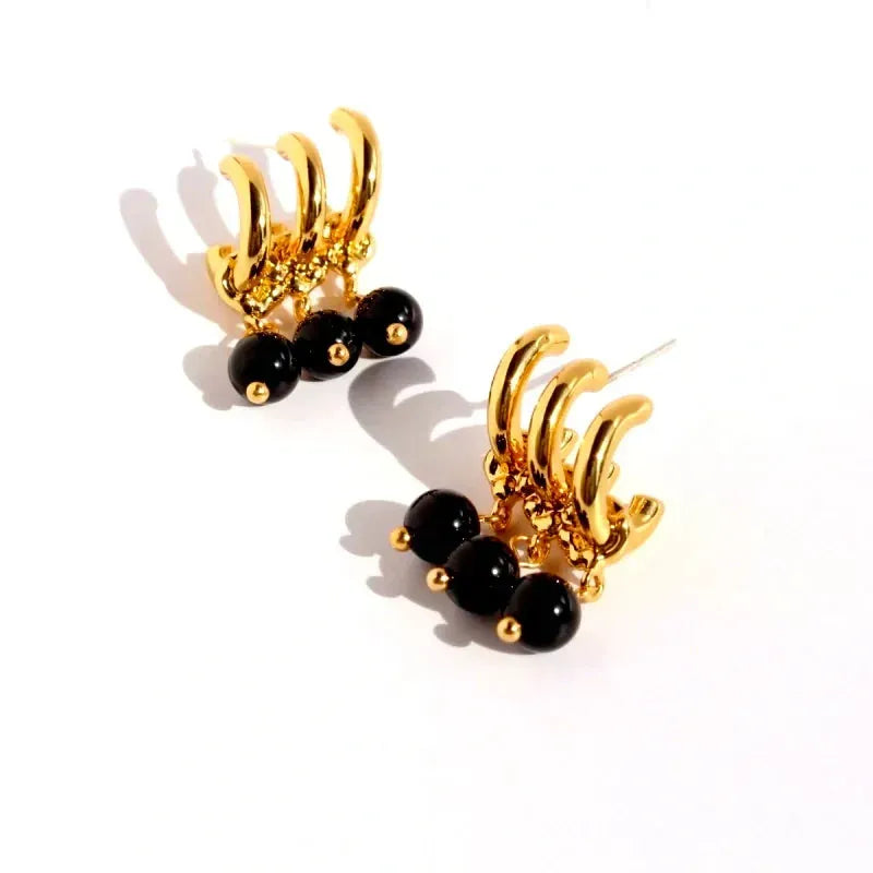 Close-up detail of the sparkling zircons and plating on the Black Bead Tassel