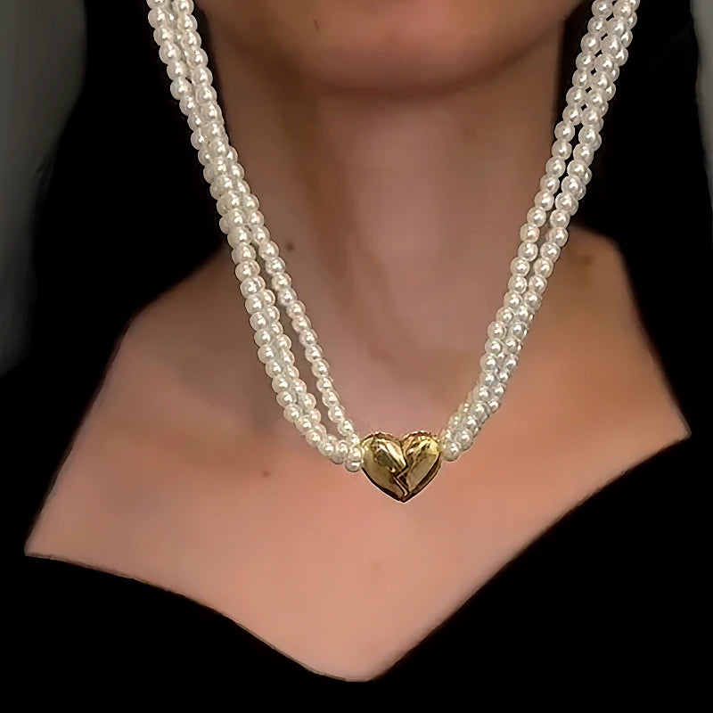 Detailed view of the 14K Gold-Plated Multi-Layered Magnetic Diamond Heart Pearl Necklace chain and pendant